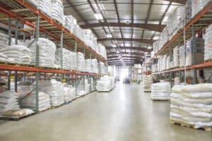 Warehouse filled with stacked bags.